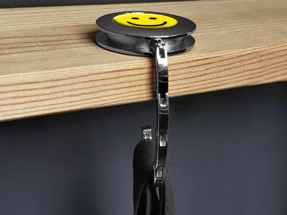 metALUm Taschenaufhänger in runder Form Smiley