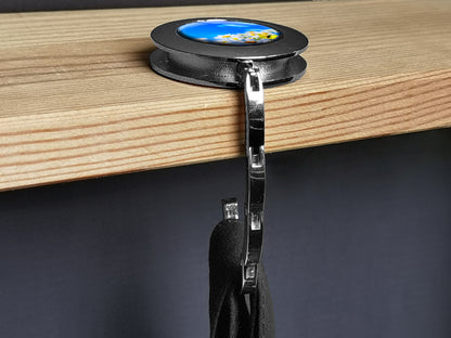 metALUm Taschenaufhänger Handtaschenhalter BLUMENWIESE mit faltbarem Magnetverschluss #2601031