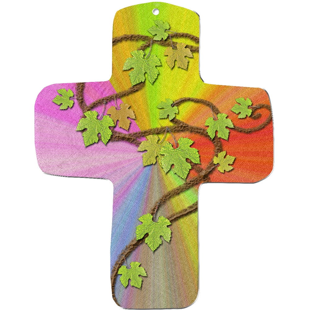 Ein leuchtendes metALUm Wandkreuz mit einem regenbogenfarbenen Hintergrund, braunem Garn und grünen Efeu-Akzenten. Dieses MDF-Kreuz ist ein farbenfrohes Geschenk zur Kommunion, das Rosa-, Gelb-, Orange- und Grüntöne wunderbar miteinander verbindet.
