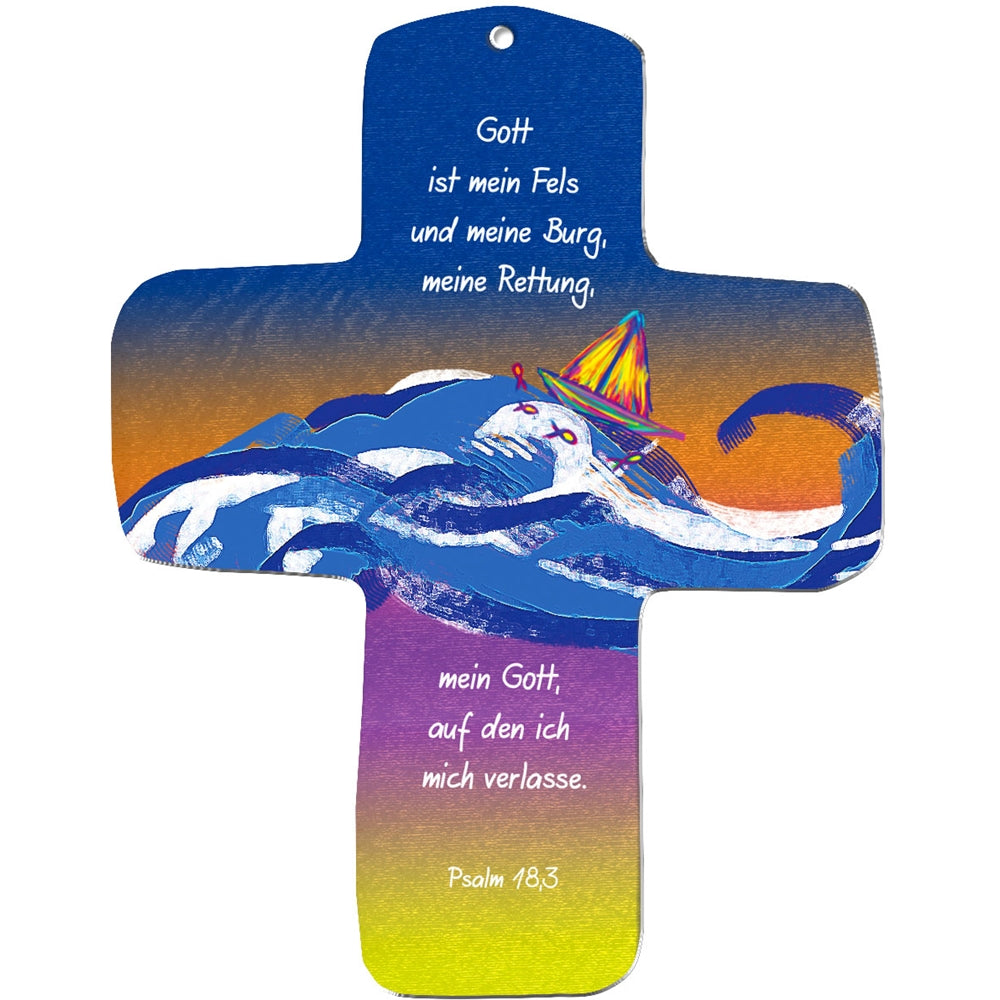 A metALUm Wandkreuz in Kreuzform mit Blau-Gelb-Verlauf, zeigt einen weißen Wal in Wellen mit buntem Hut. Deutscher Text: "Gott ist mein Fels und meine Burg." Ideal als christliche Dekoration & Geschenk zur Kommunion.